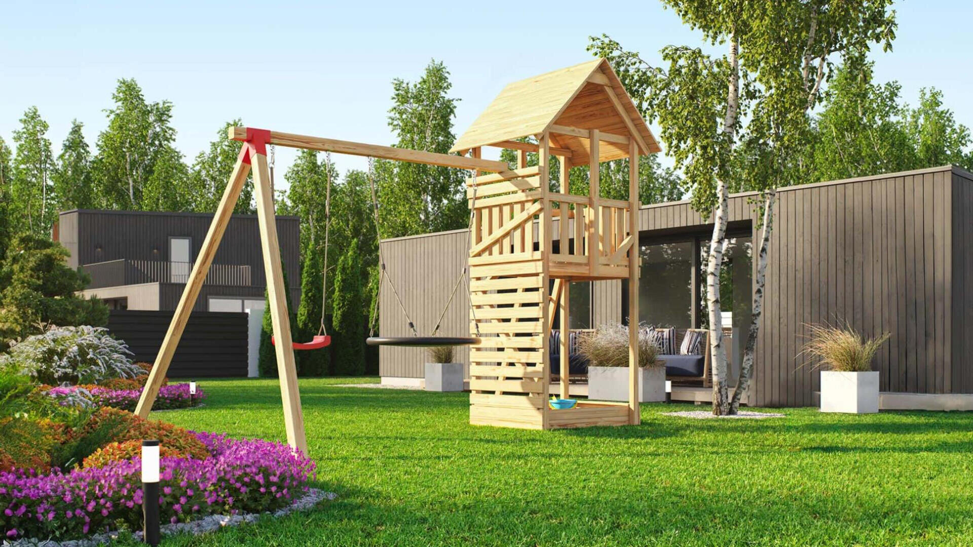 Ein moderner Hinterhof mit grünem Gras, einem Holzspielgerät mit Schaukel und Rutsche, bunten Blumen im Vordergrund und modernen dunkelgrauen Häusern im Hintergrund, die von Bäumen umgeben sind.
